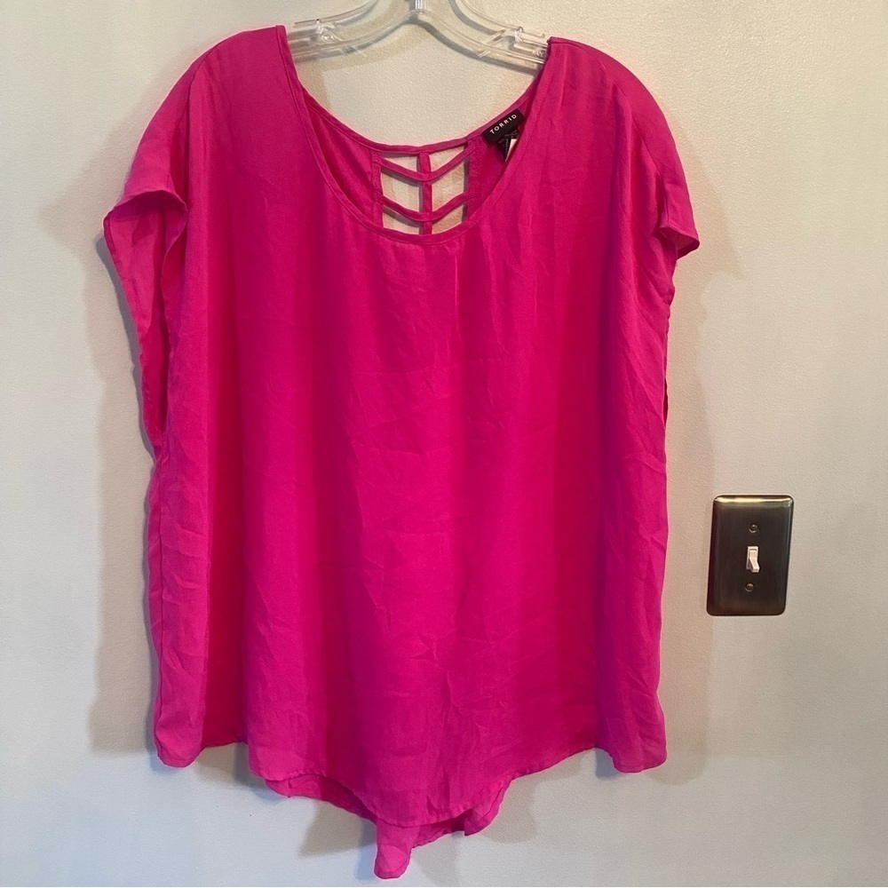 Torrid pink cap sleeve blouse with cross-cross back size 0